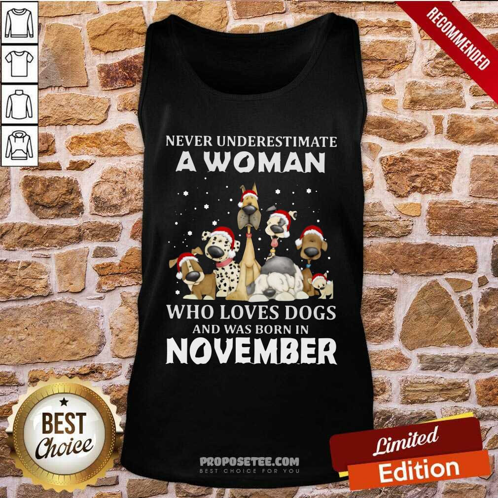 Pretty Never Underestimate A Woman Who Loves Dogs And Was Born In November Christmas Shirt - Image 4